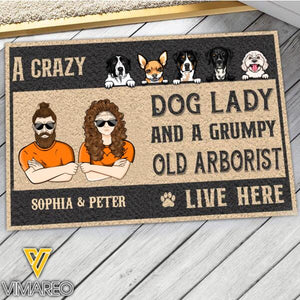 PERSONALIZED A CRAZY DOG LADY AND A GRUMPY OLD ARBORIST LIVE HERE DOORMAT TNDT2610