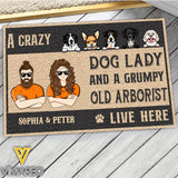 PERSONALIZED A CRAZY DOG LADY AND A GRUMPY OLD ARBORIST LIVE HERE DOORMAT TNDT2610