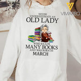 PERSONALIZED NEVER UNDERESTIMATE AN OLD LADY WHO READS MANY BOOKS AND WAS BORN IN MARCH HOODIE TNHC1401