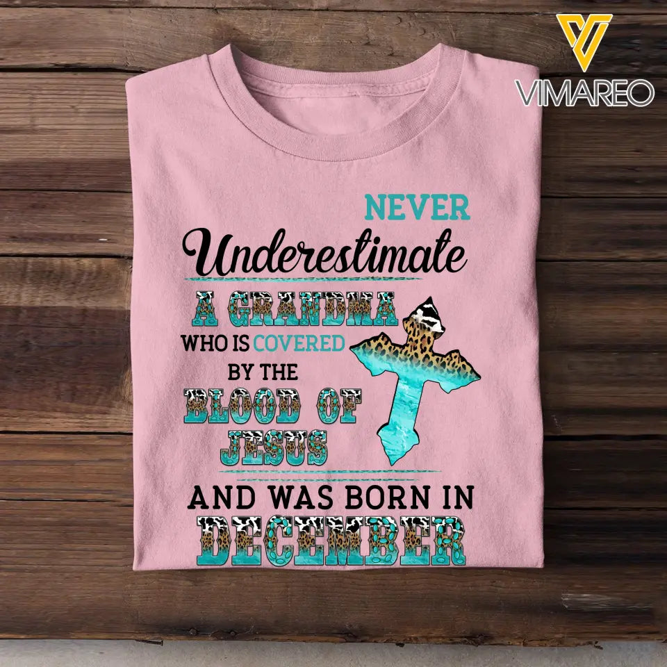 Personalized Never Underestimate A Grandma Who Is Covered By The Blood Of Jesus And Was Born In December Tshirt LDMVQ23409