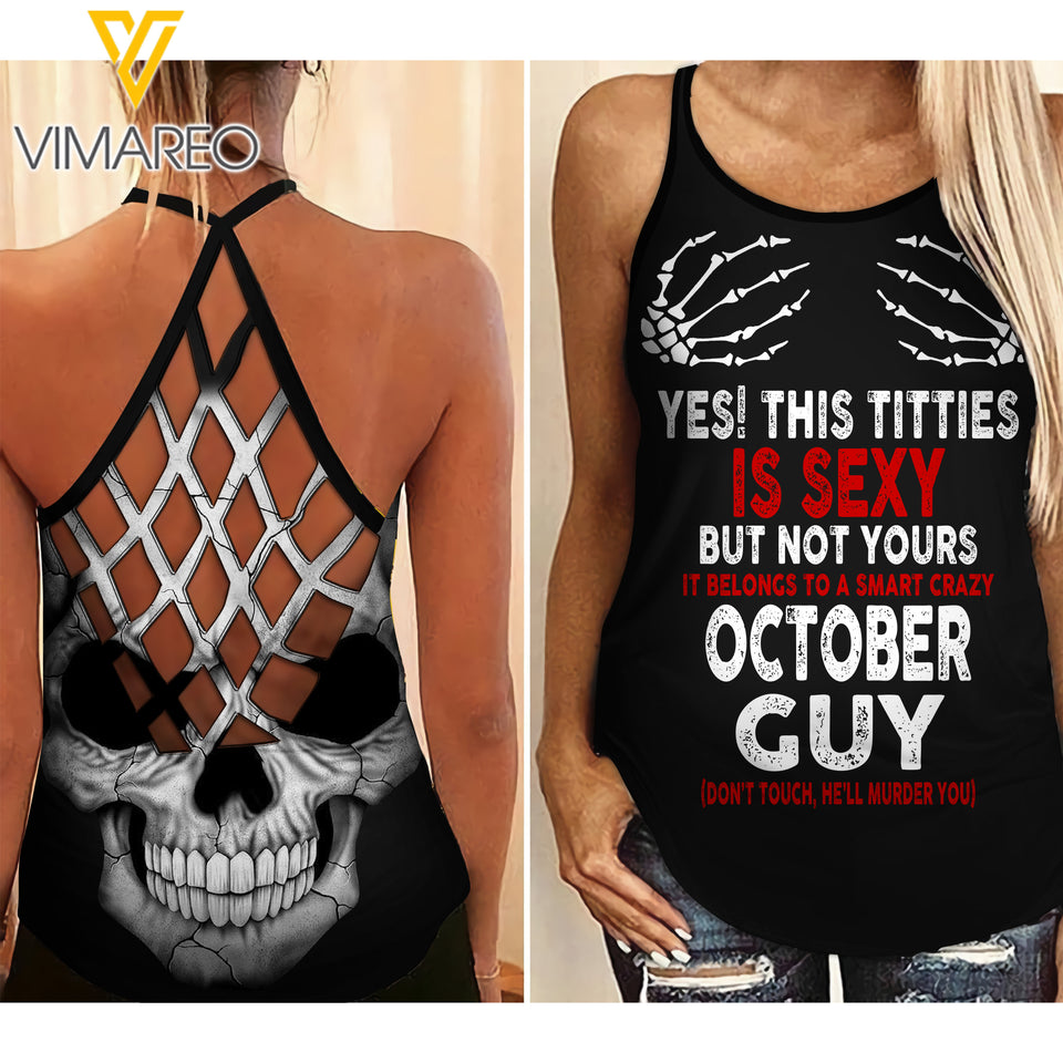 THIS TITTIES BELONGS TO A SMART OCTOBER GUY CRISS-CROSS TANK TOP